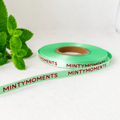 Logo Printed Onto A Mint Green Ribbon